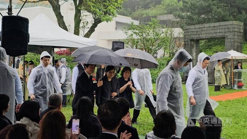 President Lai Ching-te (second left) walked into the venue in New Taipei with Cheng's wife on Tuesday.