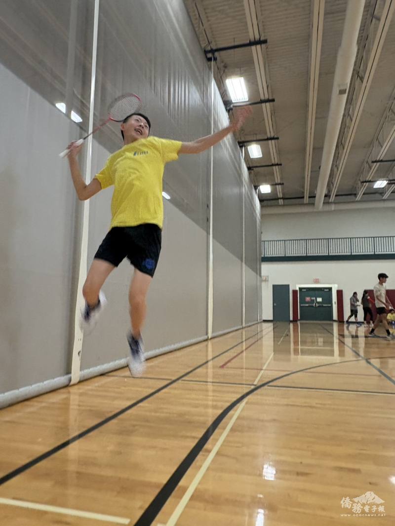 One of the best FASCA badminton players prepared to hit a smash!
