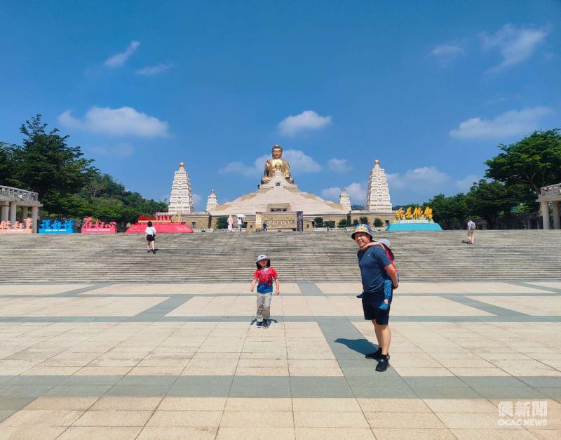 Michael and his two sons at Fo Guang Shan in Kaohsiung, discovering Taiwan's Buddhist traditions and culture.