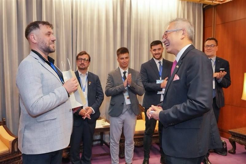 Deputy Foreign Minister François Wu (front right) welcomes visiting parliamentary staff from European countries, including delegation leader Matej Števove (front left), at the Ministry of Foreign Affairs in Taipei on Thursday. Photo courtesy of the Minist