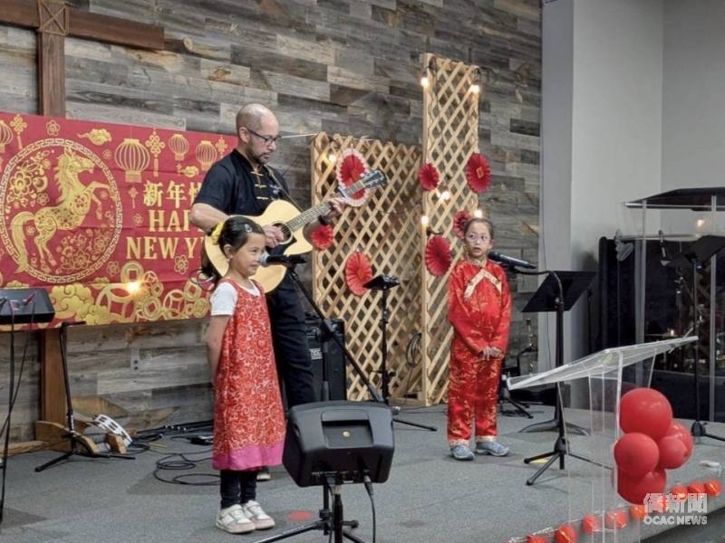 Daniel Mejia performs with his daughters at an EFCI Chinese School event in Irvine.