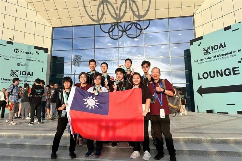 Taiwanese senior high school students pose for a photo wearing their medals and holding the Republic of China (Taiwan) national flag at the International Olympiad in Kazakhstan. Photo courtesy of National Central University