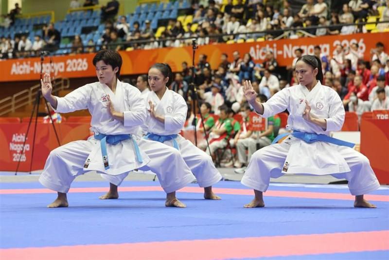 Chien Hui-hsuan, Tien Xin-er and Hung Chih-hsuan (from left to right) defeat Nepal 5-0 to win a bronze medal at the 2026 Aichi-Nagoya Asian Games on Tuesday. Photo courtesy of the Chinese Taipei Olympic Committee