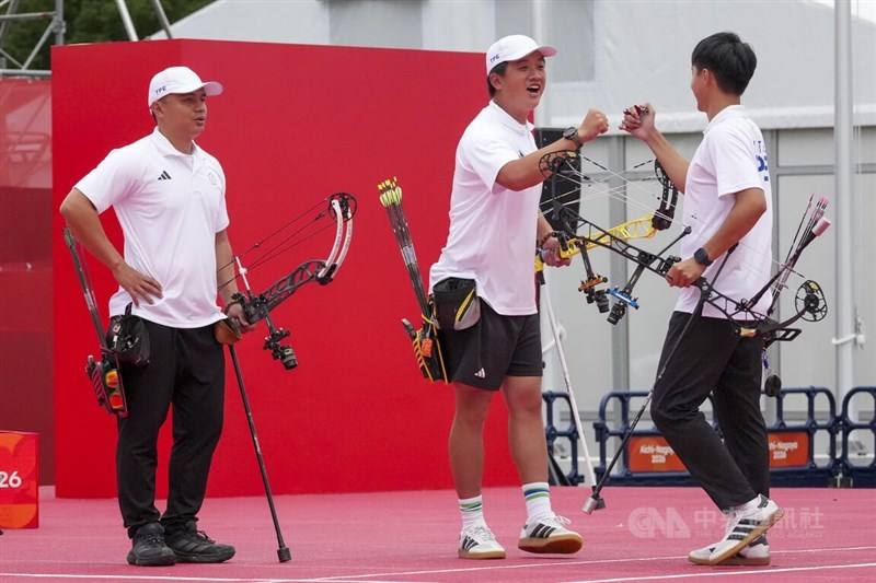 Taiwanese archers fist-bump in celebration after defeating South Korea 234-233 to take compound team bronze at the Nagoya Asian Games on Wednesday. Sept. 30, 2026