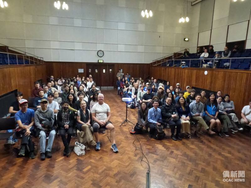 Taiwanese residents in the UK and audience members from Britain, Hong Kong, Japan and Ukraine pose for a group photo after the screening and discussion of A Chip Odyssey.